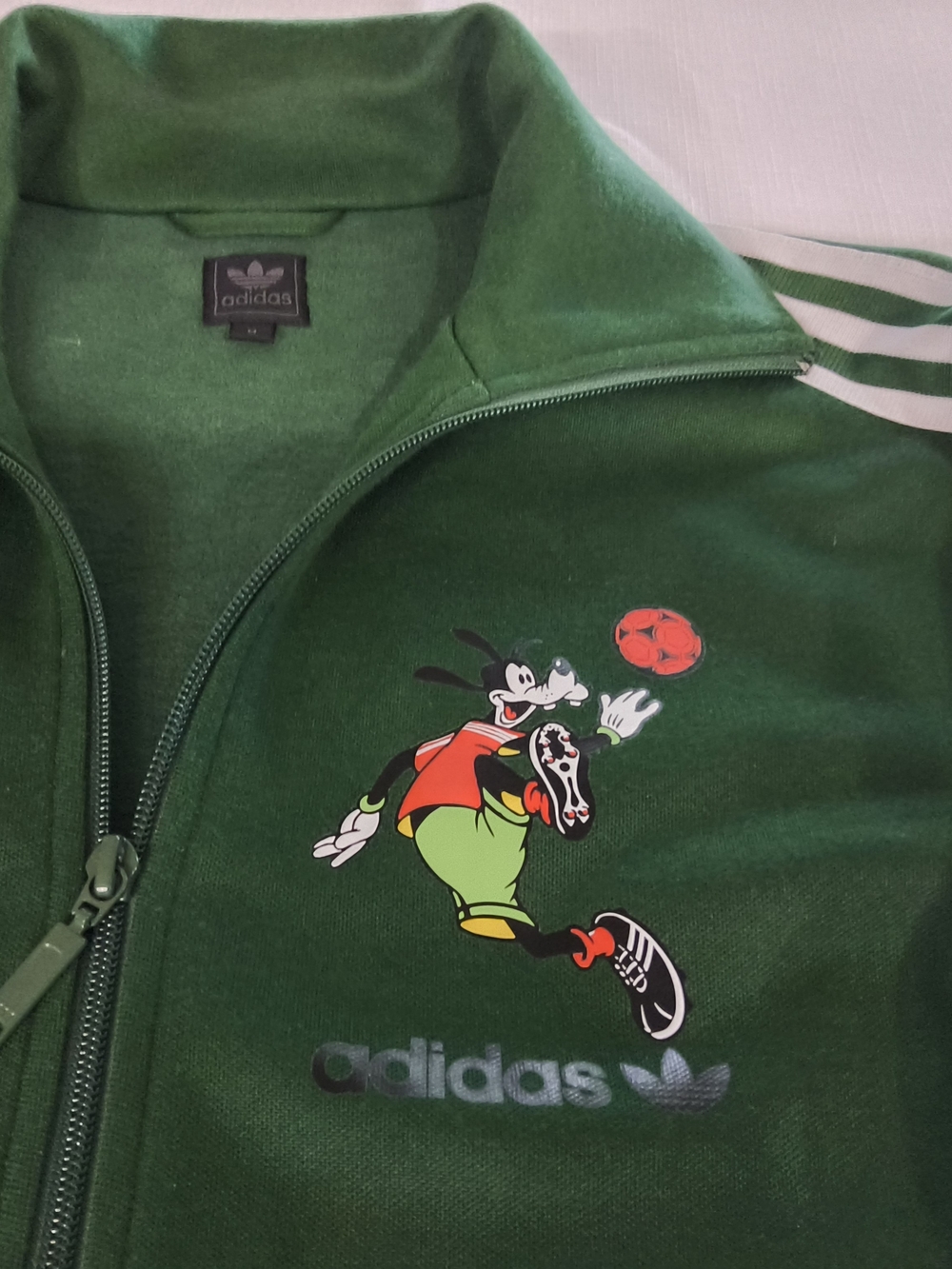 Vintage Adidas Green Track Jacket with Cartoon Soccer Graphic. Size Medium